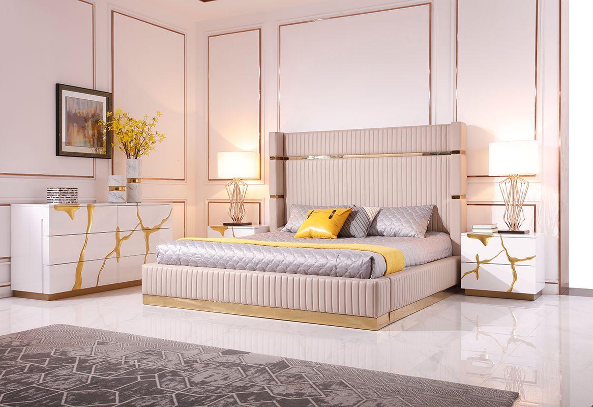 

    
Glam Beige Leather & Gold CAL King Platform Bedroom Set 6Pcs by Modrest Sterling
