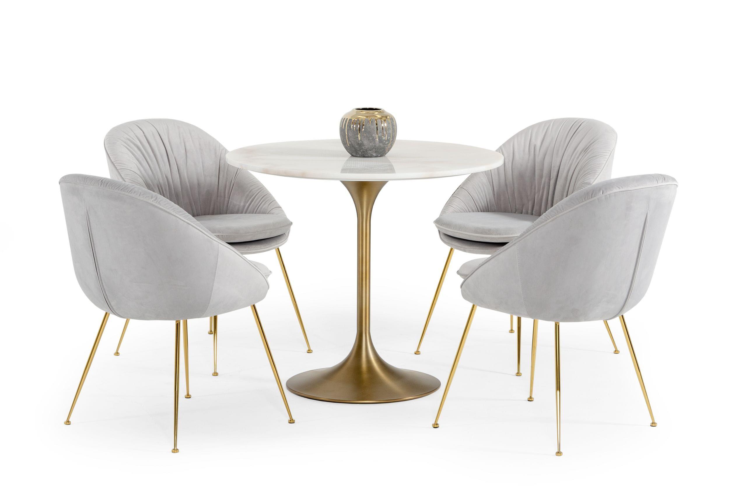 

    
Glam White Marble & Gold Dining Table by VIG Modrest Collins
