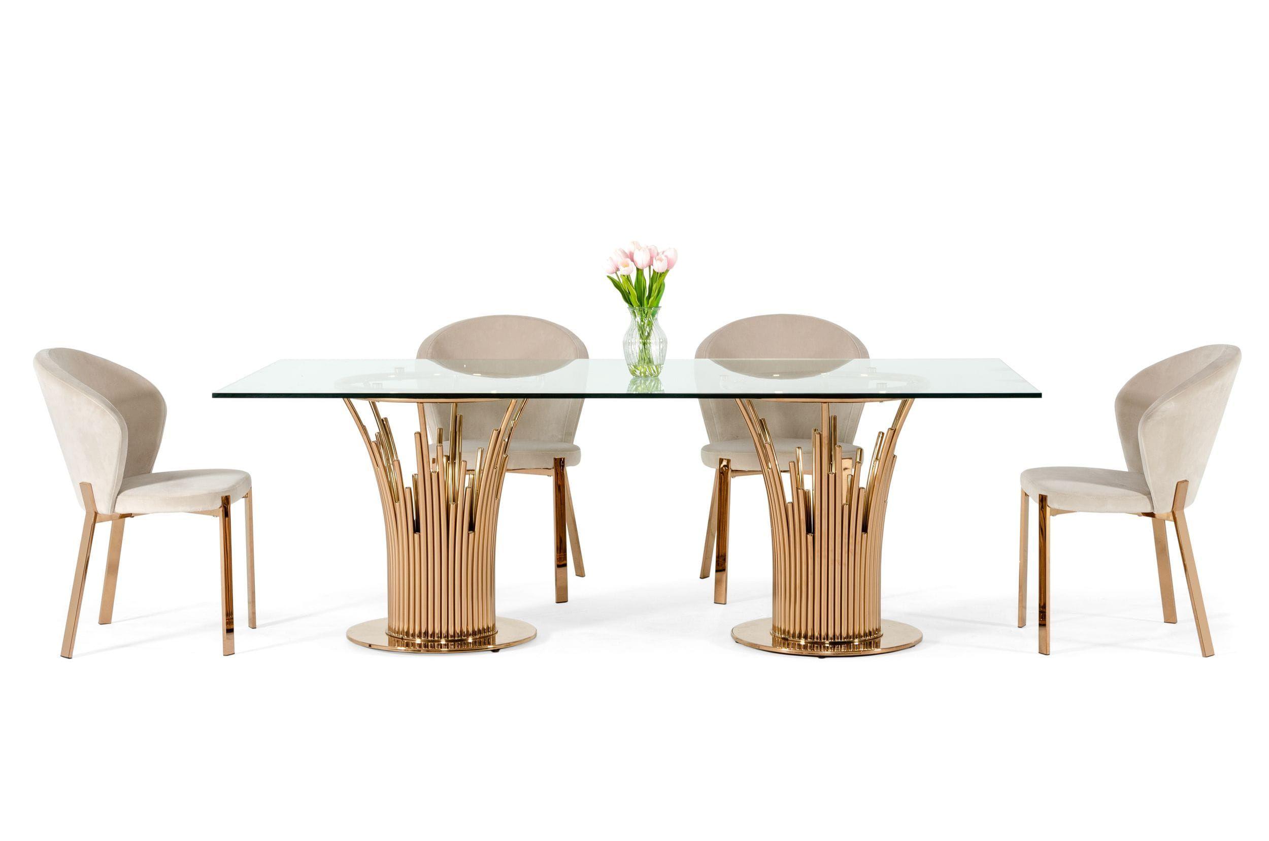 

    
Modern Glass & Rosegold Dining Table + 4 Chairs by VIG Modrest Paxton
