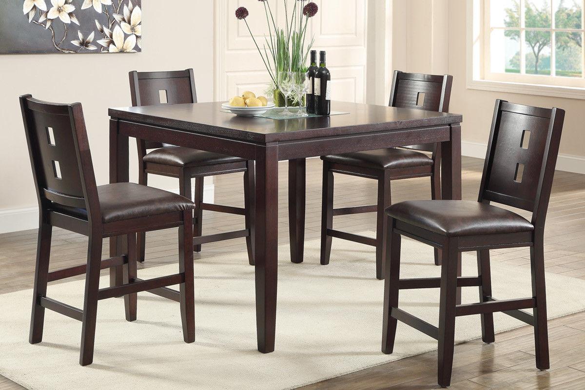

    
Poundex 2164 & 1143 Brown Table & Faux Leather Chairs Counter Height Dining Set 5Pcs
