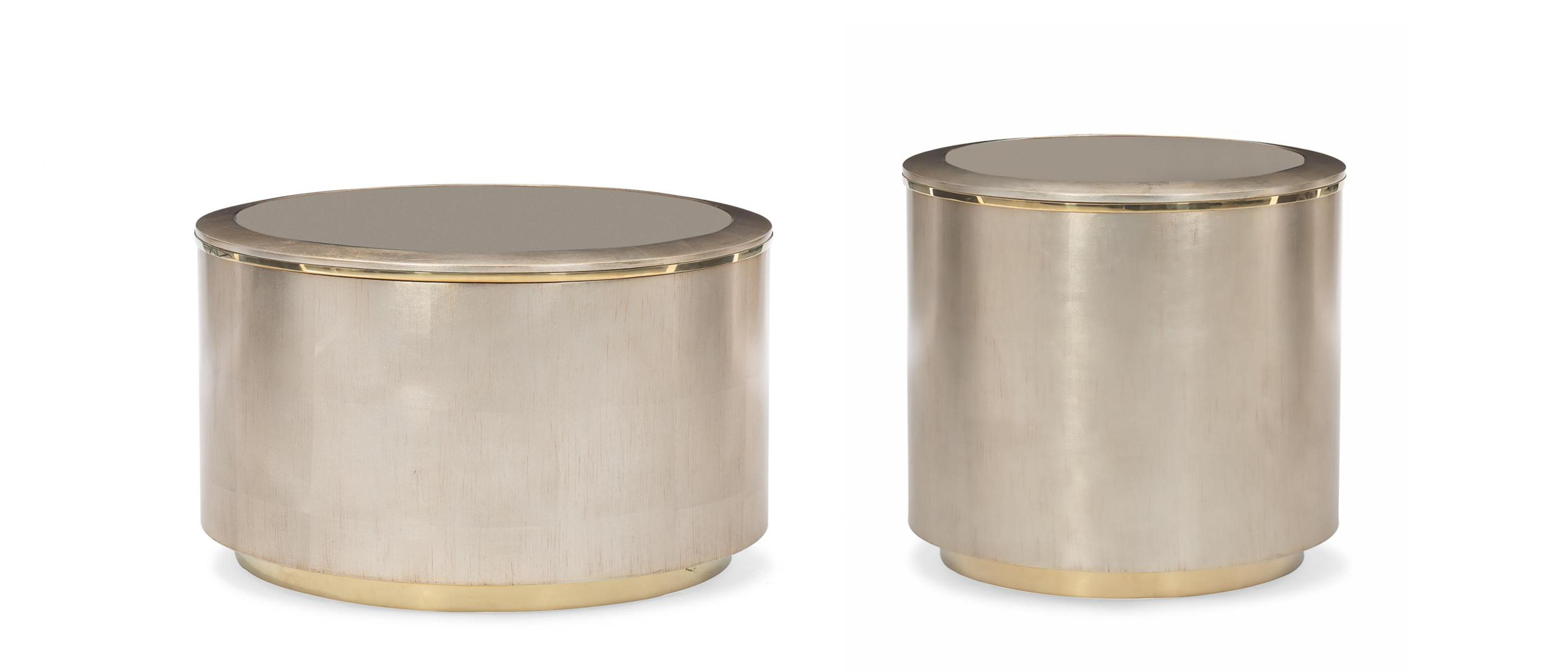 

    
Silver Leaf Tones W/ Warmth Of Gold Coffee Table Set 2Pcs CIRCLE IN TIME by Caracole
